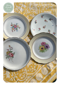 Composition de 4 assiettes plates en faïence et porcelaine