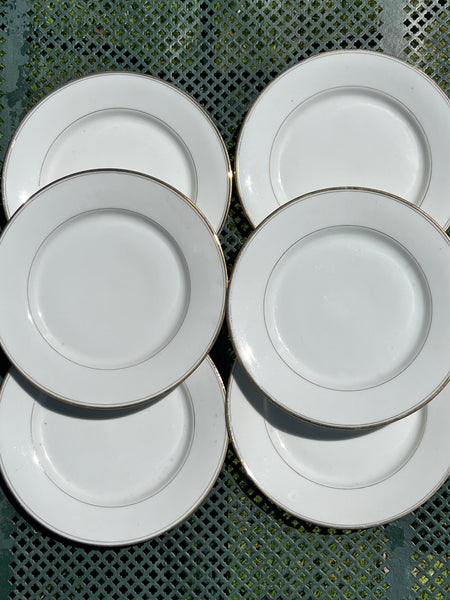 Assiettes plates, porcelaine de Limoges